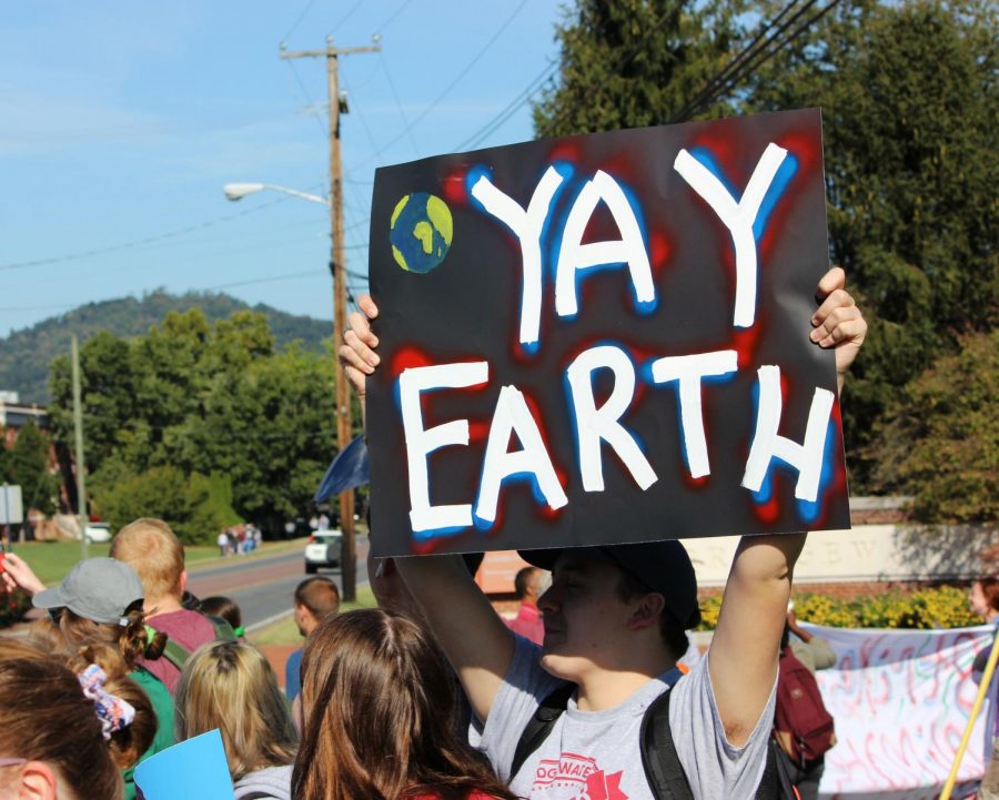 Bridgewater junior Josh Sprouse, photographed holding the “Yay Earth” sign, said, “As a member of Eco-Action, I participated in the climate strike because what’s happening to our planet isn’t healthy. I love working in nature and observing what beauty there is, but in 50 years or so, there won’t be anything for me or other botanists, mammalogists, or biologists to observe and appreciate. We have to start making a change now since there’s no turning back.”