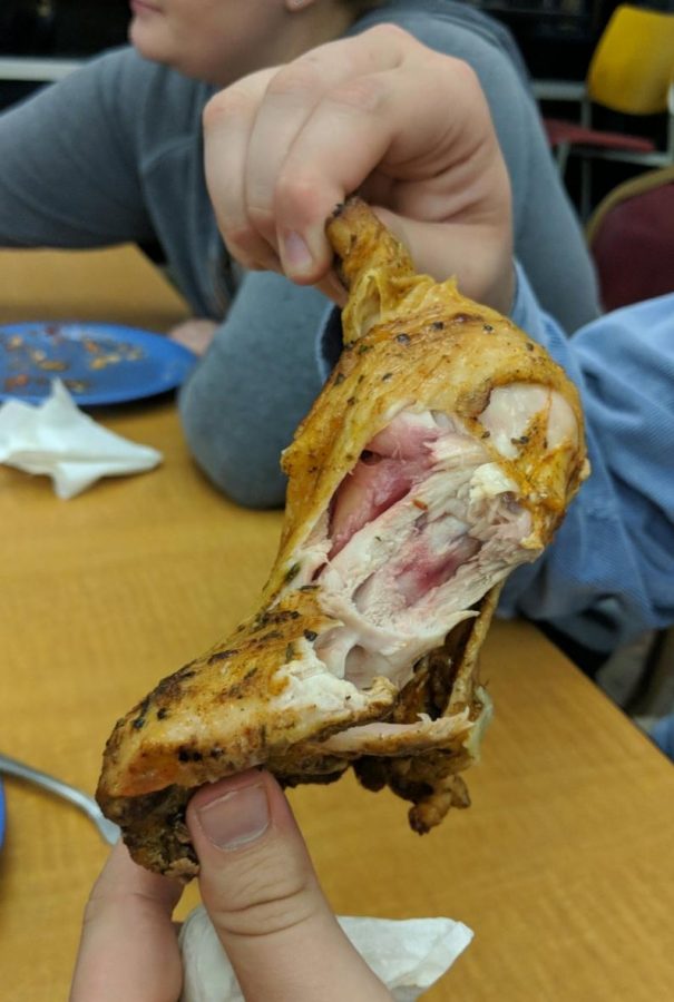 Sophomore Reilly Perry was given uncooked bone-in chicken for dinner one night at the dining hall. Manager Christopher Beach explained this is sometimes a result of batch cooking with the thicker bone-in meat instead of flatter, boneless chicken breasts.