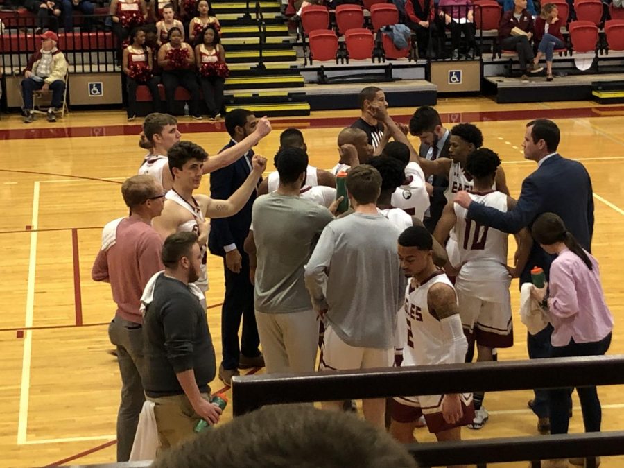 Bridgewater men’s basketball huddles up during a 2020 home game against EMU. The Eagles will be joined by two new assistant coaches this upcoming season.