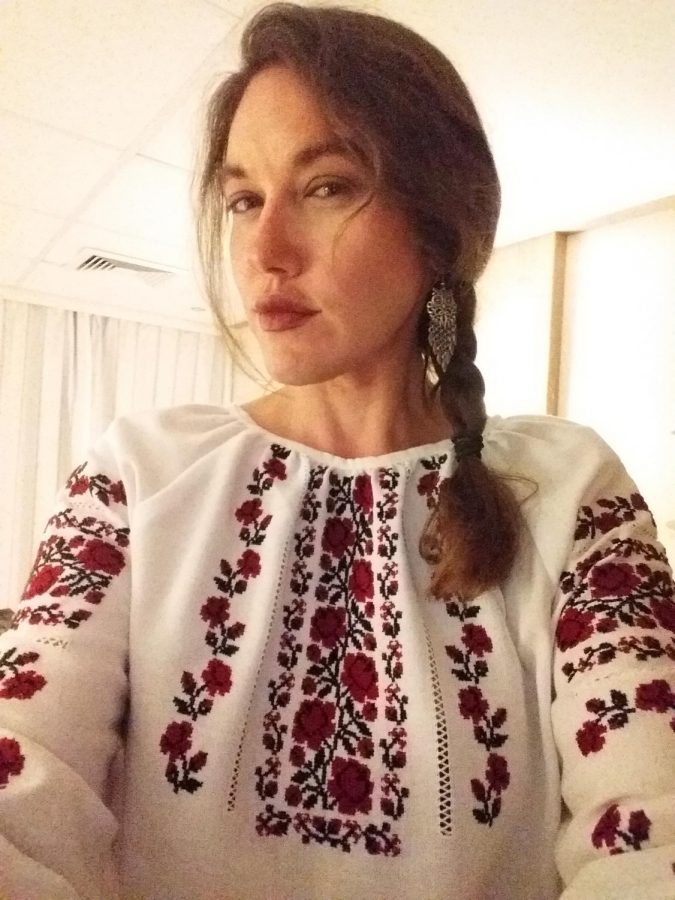 Nicole A. Yurcaba, instructor of English at Bridgewater College, wearing a vyshyvanka--an embroidered blouse. The vyshyvanka is a form of traditional Ukranian art.