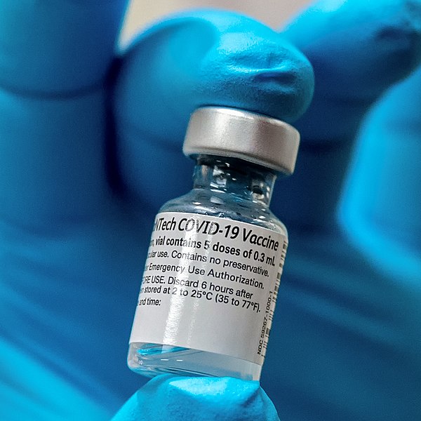 Army Spc. Angel Laureano holds a vial of the COVID-19 vaccine, Walter Reed National Military Medical Center, Bethesda, Md., Dec. 14, 2020. (DoD photo by Lisa Ferdinando)