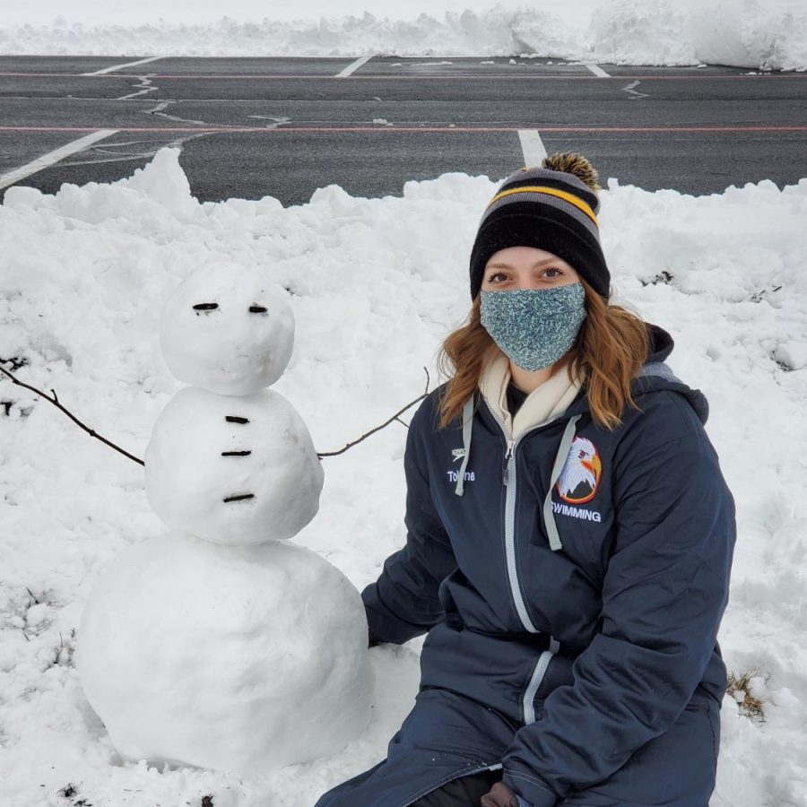 First-year student Katie Tolone and snowman