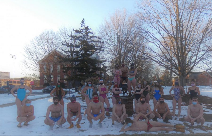 The Bridgewater Men and Women’s swim team took their yearly photo in the snow next to the eagle statue in front of Yount Hall.