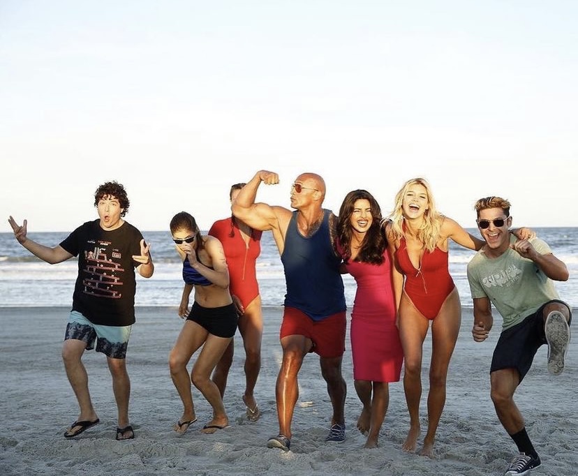 Baywatch+Movie+cast+on+the+beach+-+featuring+The+Rock%2C+Zac+Efron%2C+Priyanka+Chopra+and+Alexandra+Daddario
