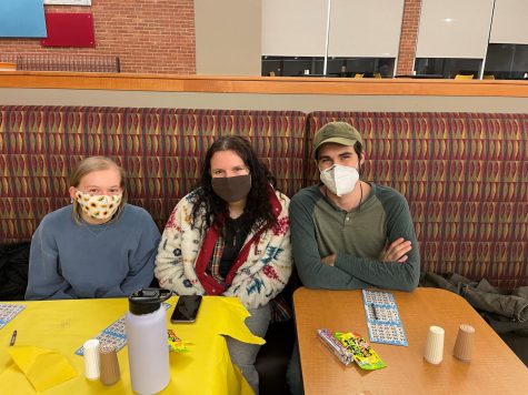 Juniors Sarah Shepard, Hannah Barnett and Edward Jones prepare for their first bingo game of the new semester.