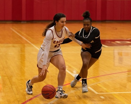 First-year guard Reagen Maynard driving down the court to cut the Generals’ lead in the game on Feb. 9. The Eagles lost to the Generals 81-39.