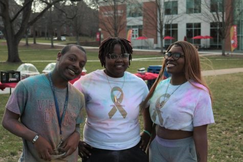 Junior Ambria Brennan (right), standing with first-year Anthony Blow (left) and junior Shaleria Bradley (middle)