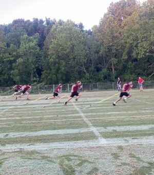 Bridgewater Baseball team improving their speed by doing chain runs one morning.