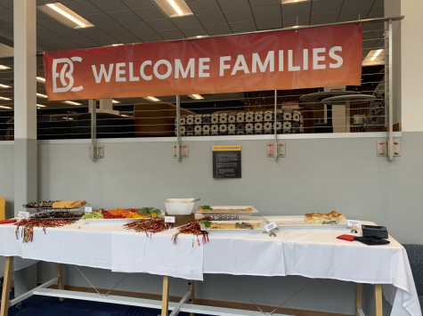 A sign is hung in the FLC and says Welcome Famillies.
