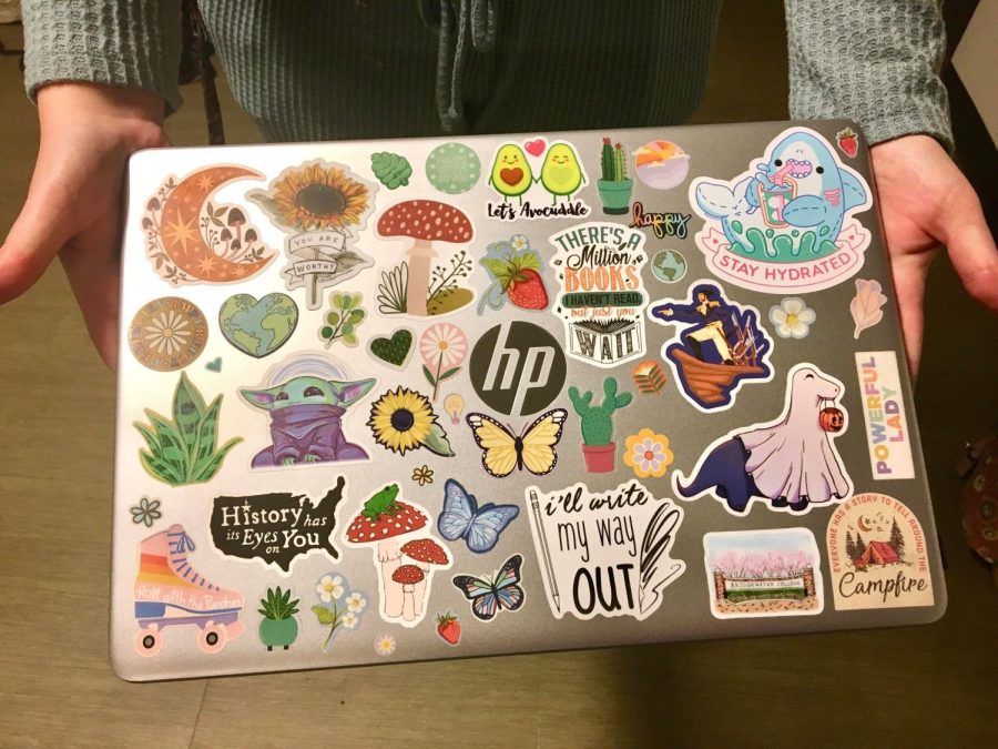 A+photo+of+sophomore+Annabelle+Terry%E2%80%99s+laptop%2C+which+is+decorated+with+several+stickers.