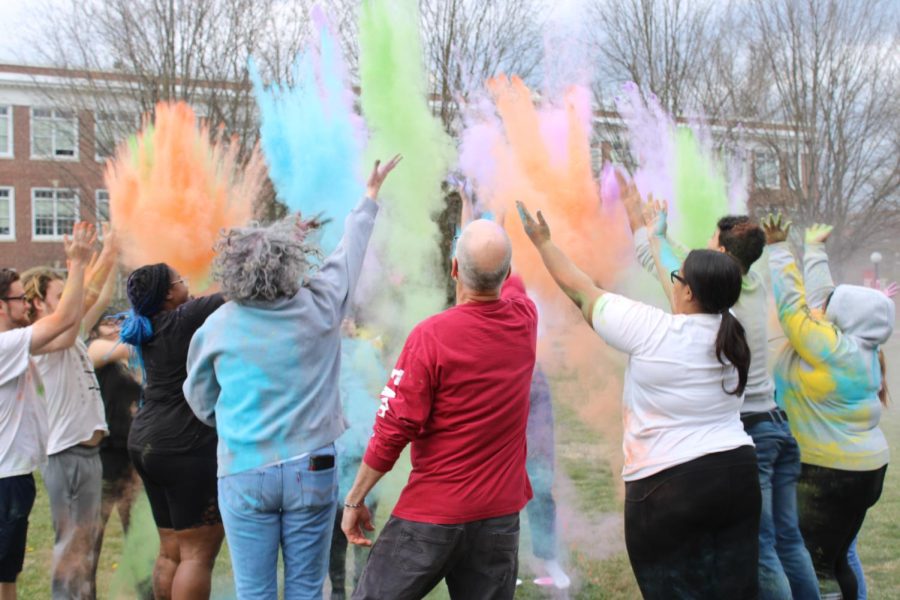 By the end of the powder throwing, participants were covered in different colors. A station with wet wipes to clean off was provided at the event.
