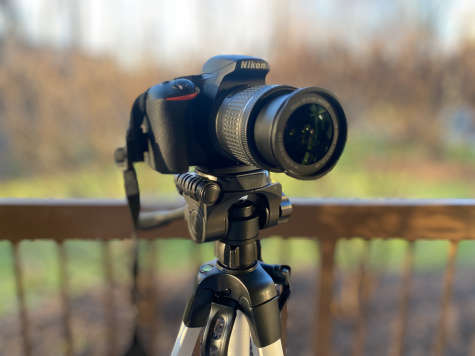 A close-up of a camera on a tripod