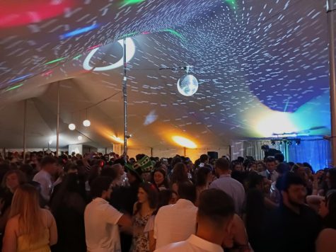 The crowded dance floor in the tent at the Spring formal.