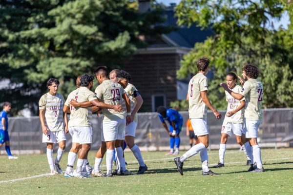The Eagles celebrate a goal scored during an early-season match against Regent on their home turf, with freshman standout Gavin Kast in the spotlight. As the season progresses, the team eagerly anticipates their continued contributions from the freshman class.