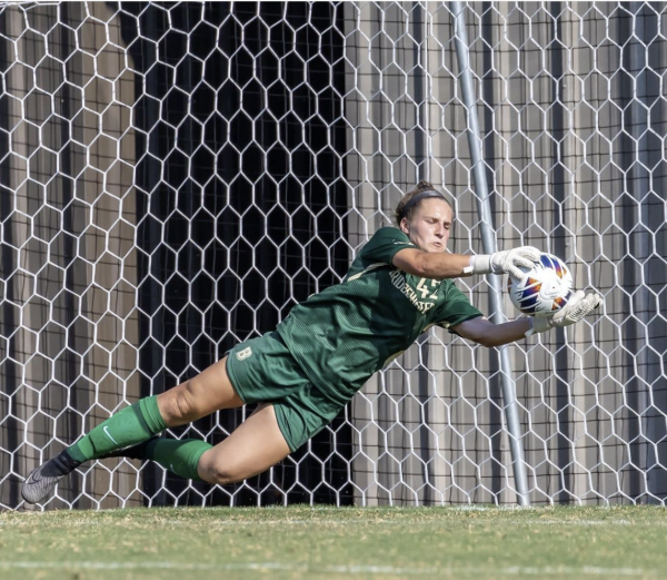 Senior goalkeeper Carlee Gaboury makes a save in a game earlier this season. The Eagles record this season is 5-2. 
