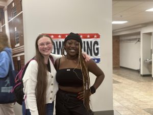 Junior Casey Beard and sophomore Jamiah Mark hang out at the after party on October 20th. They are surrounded by cast, crew, and friends.