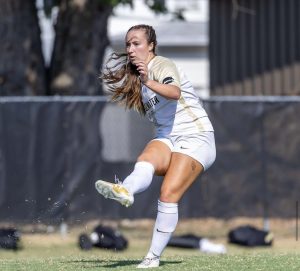 Senior Hannah Nugent making a forward pass in a game earlier this season for the Eagles. The Eagles are 12-5-1 and 7-3 in conference play.