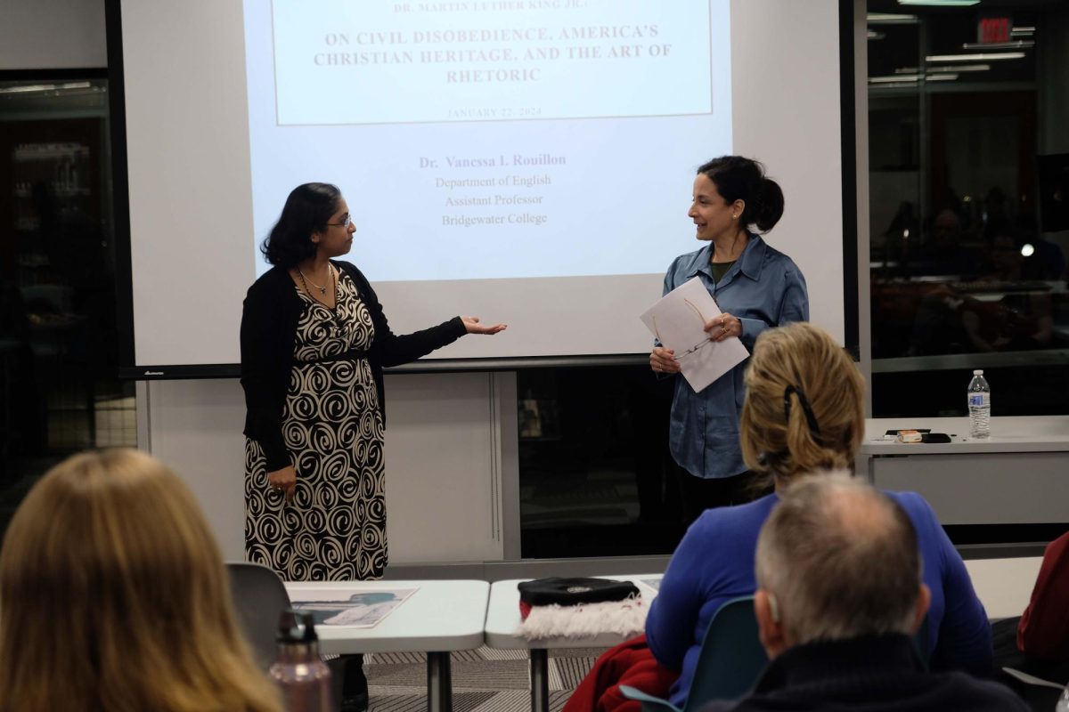 Dr. Vanessa Rouillon, Assistant Professor in the Department of English at Bridgewater, is being introduced by Dr. Gauri A Pitale, former Associate Dean of Diversity, Equity, and Inclusion at Bridgewater. The lecture was about the suffering MLK went through while fighting for civil rights.