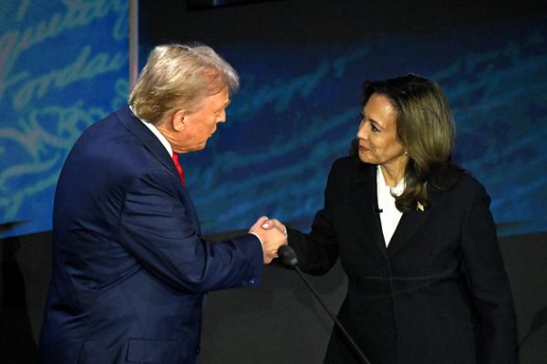 Donald Trump and Kamala Harris shake hands at the presidential debate in September. Almost 150 million Americans voted on Nov. 5 to determine the 47th president of the United States.