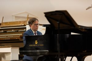 Dr. Larry Taylor, professor of music at Bridgewater, performs on the piano at a faculty recital. Performances like these inspire students and those in the community.