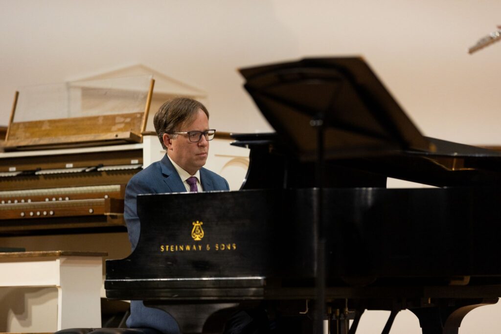 Dr. Larry Taylor, professor of music at Bridgewater, performs on the piano at a faculty recital. Performances like these inspire students and those in the community.