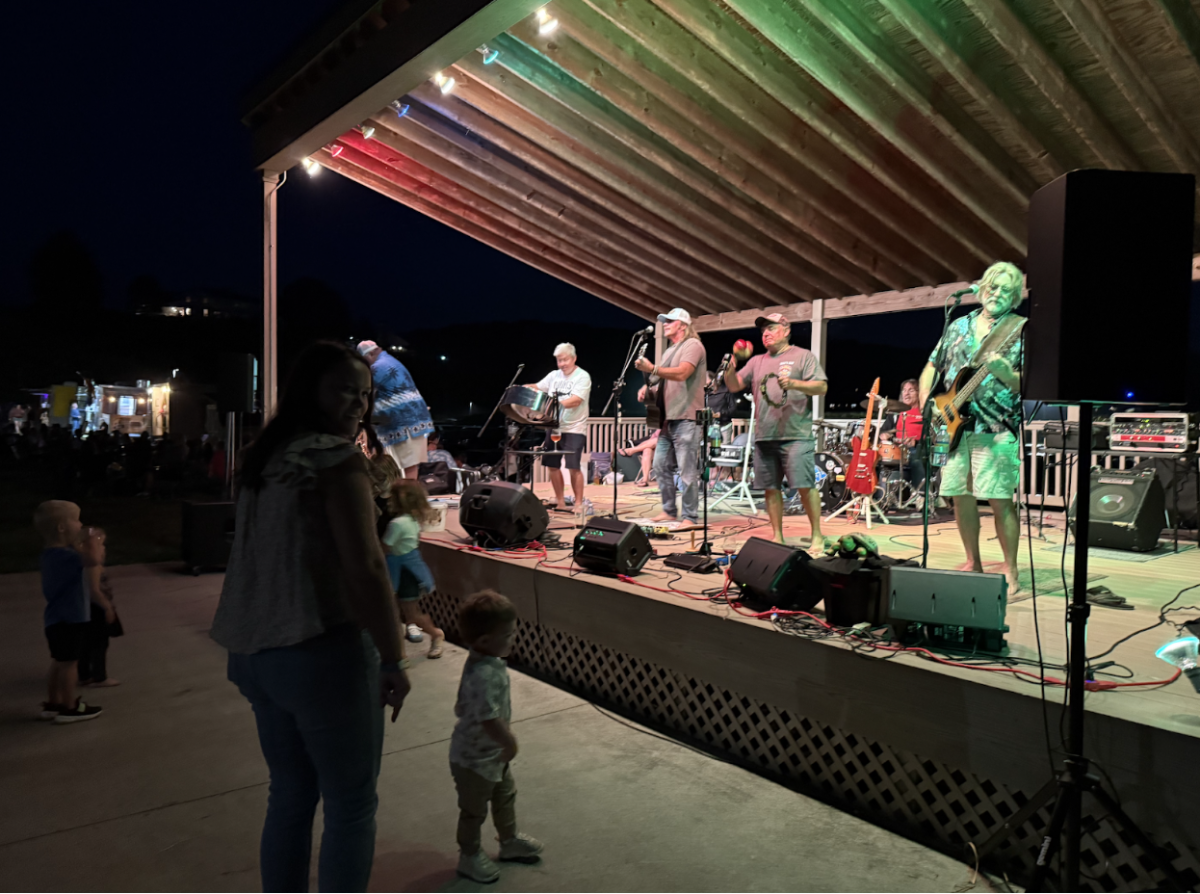 The Chris Sacks Band performing at Bluestone Vineyard. Families danced in front of the band, ate food, and visited with friends.

Photo by Olivia DeWan