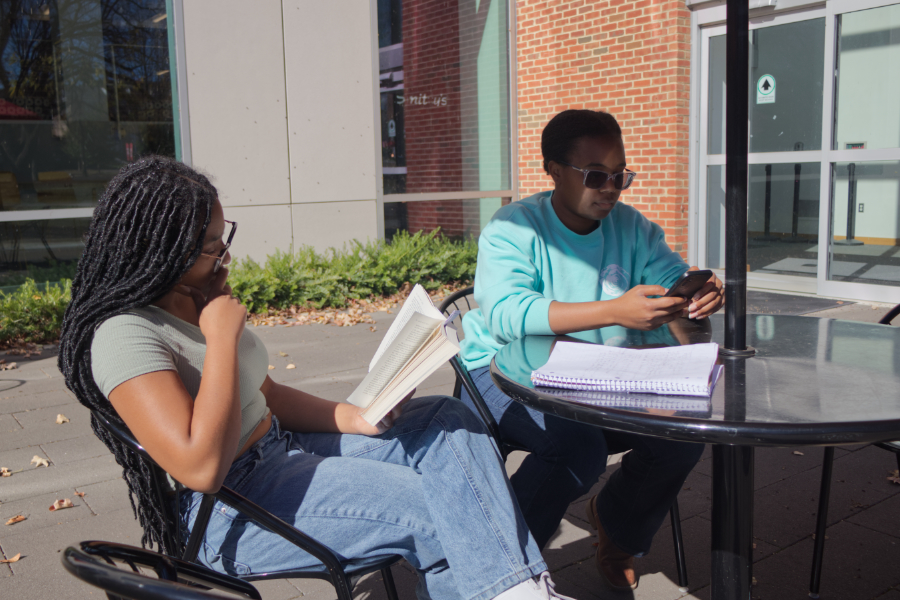 Students sitting on the Forrer Learning Commons’ patio to relax. The patio is a popular location on campus where students can meet new people and build connections.