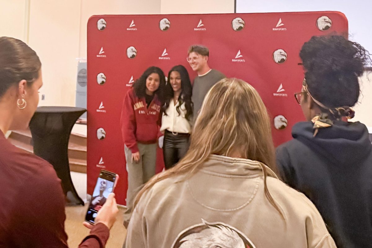 Bridgewater College students wait in line for the post-lecture meet and greet with Tara Davis-Woodhall and Hunter Woodhall. The Endowed Lecture series gives students and community members the chance to hear influential speakers share their real-world experiences.