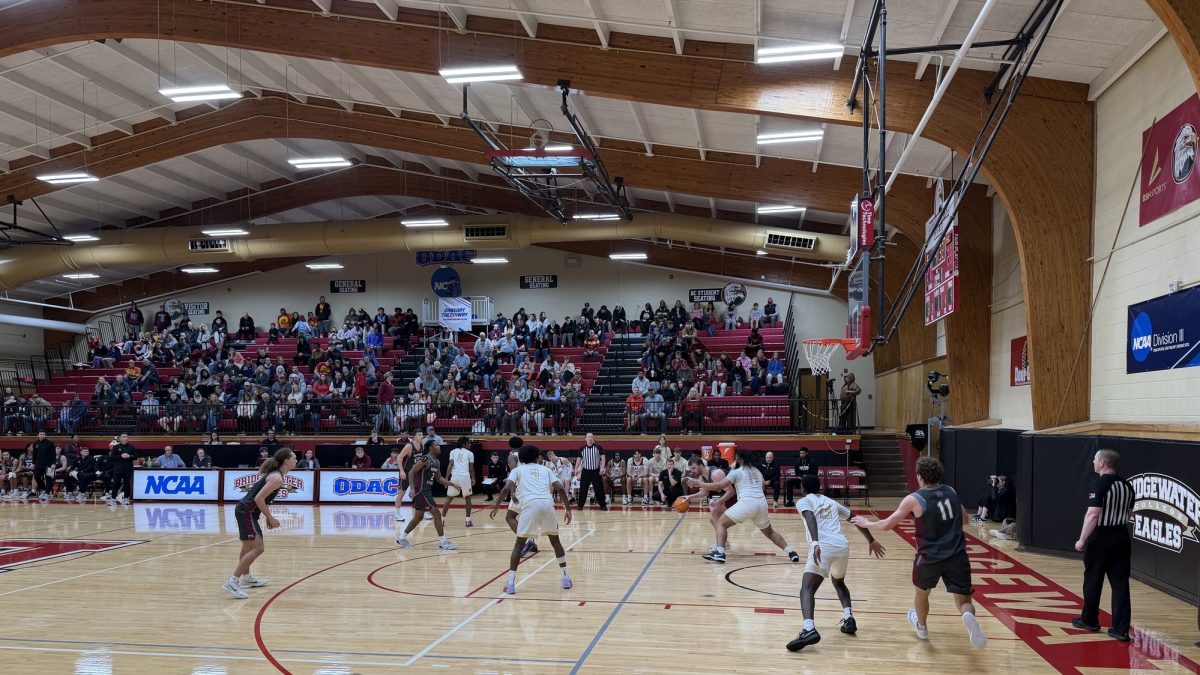 Bridgewater’s Maleek Richardson defends Hampden-Sydney post during the Eagles’ home game on Jan. 10. Bridgewater fell 80-67 to the nationally ranked Tigers in the ODAC matchup. 