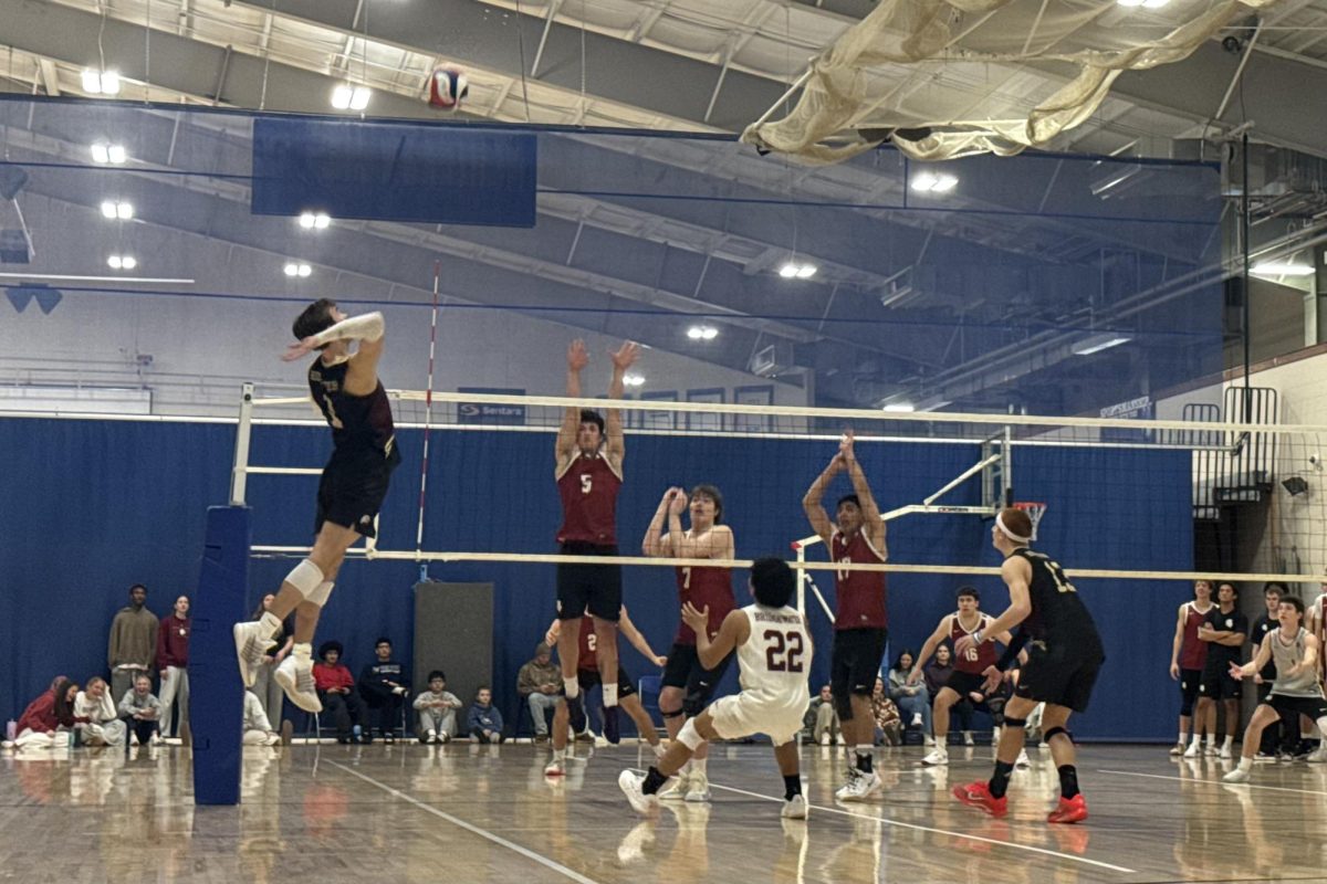 Jeffrey Prevost taking a swing at the ball. The Eagles fell to the Royals before splitting sets with EMU alumni. 