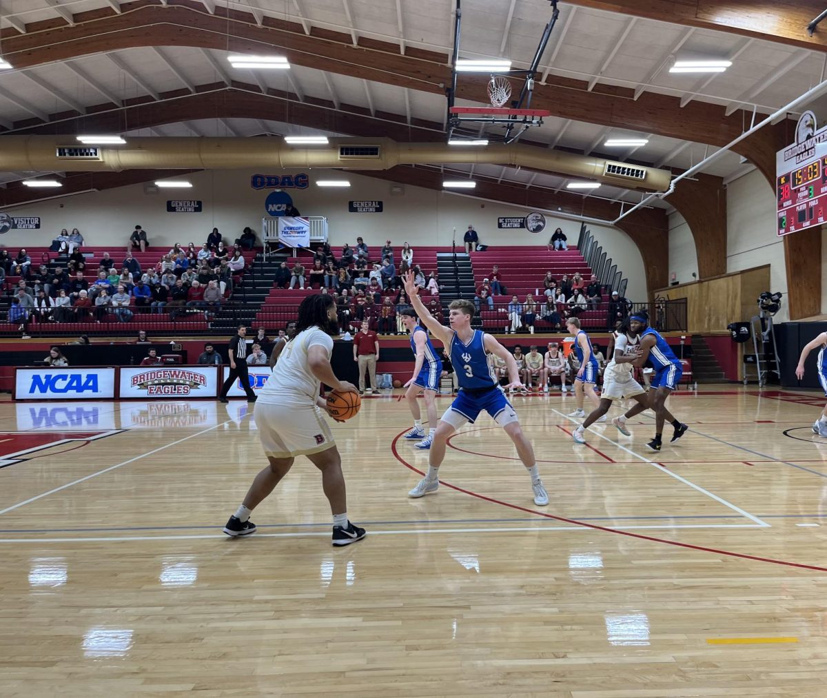 Senior Maleek Richardson in possession of the ball as he looks for the next pass. Richardson plays as a guard for the Eagles.