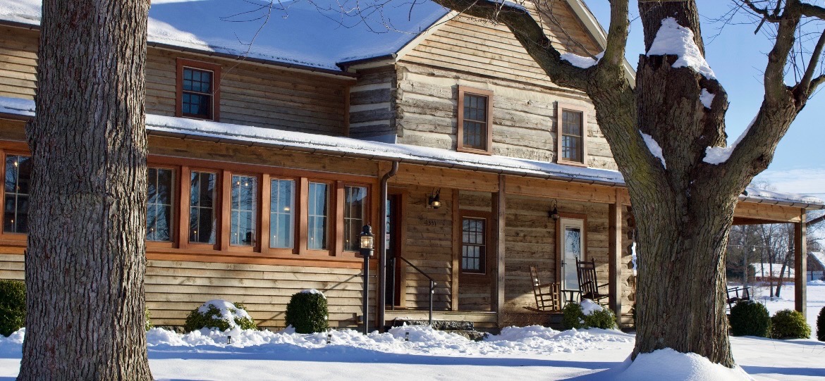 Silver Lake Bed and Breakfast front entrance where guests sign in upon arrival. Guests have access to the wrap around porch. 