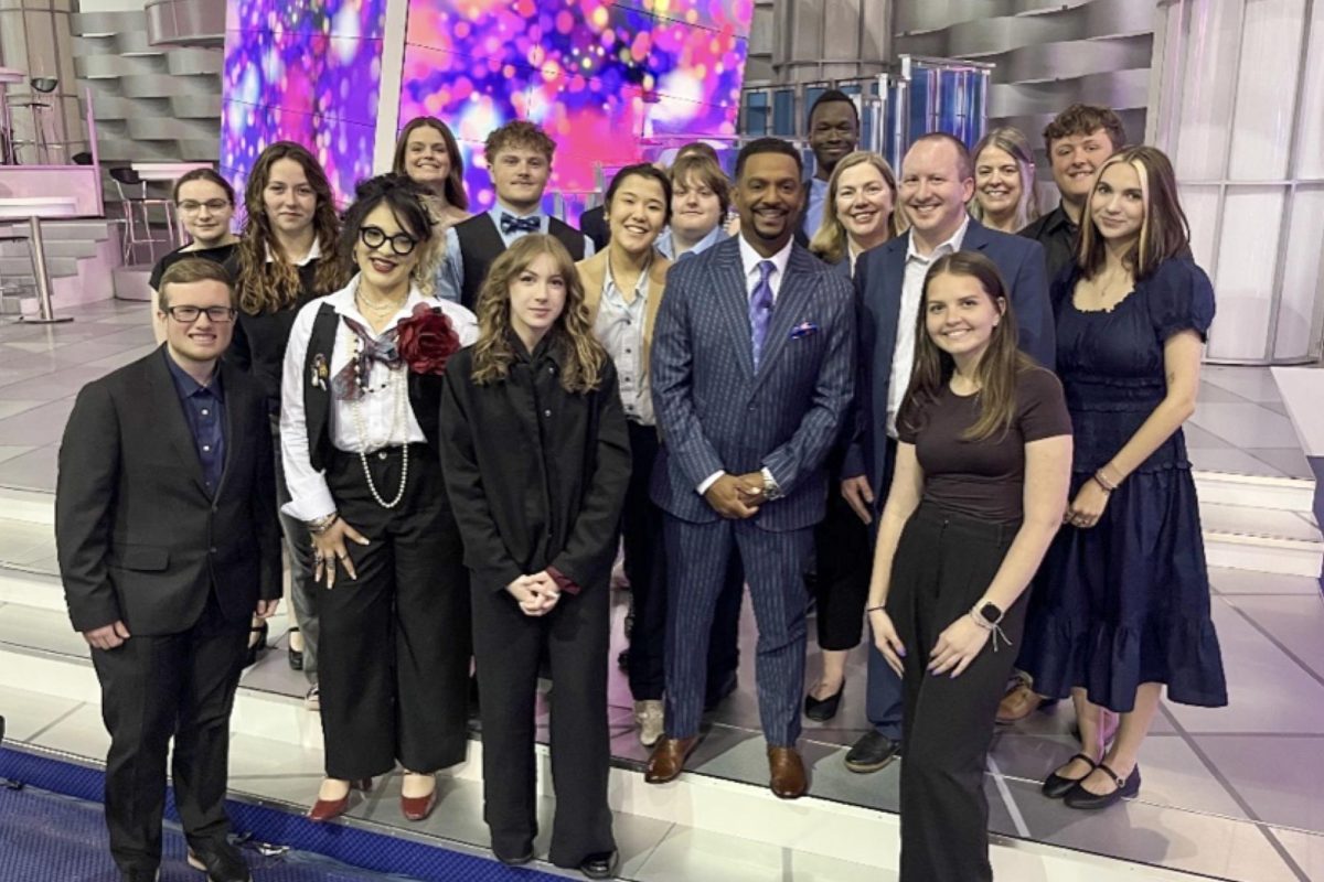 Bridgewater College students pose with America's Funniest Videos host Alfonso Ribeiro. The students acted as audience members for an episode of the TV show.