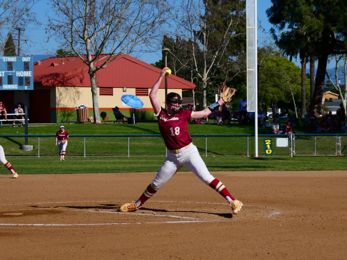 Senior pitcher Mackenzie Cauthorn throws a pitch for Bridgewater College during a game against Chapman University. Bridgewater faced Chapman during the first day of their California trip. Photo by Raegan Cullen. 