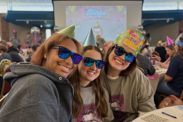 From left to right, Jai Johnson, Anabelle Dragan and Peyton Lawrence pose in birthday hats and sunglasses at D.C. Flory’s Birthday Bash. The celebration included bingo, raffles and trivia.