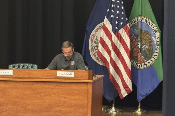 Councilman Steve Schofield presents the council with the treasurer's report and town bills for the month of April. Schofield serves as the finance committee chairman for the council.
